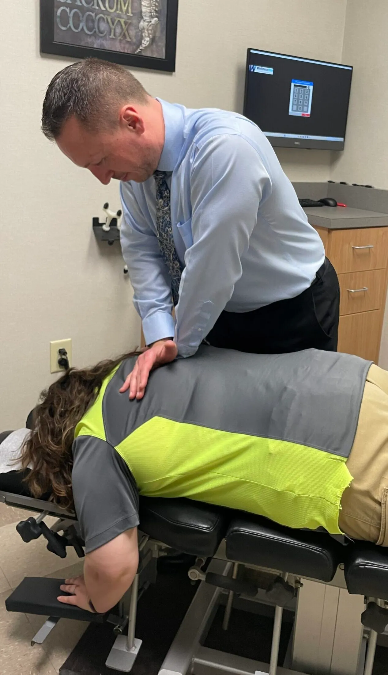 Dr. Charlie Gray treat patients back pain