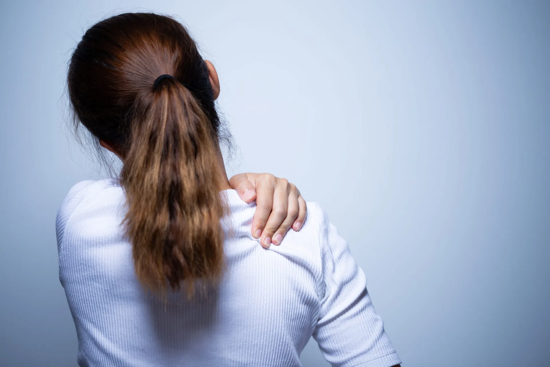 Woman has neck pain and injury